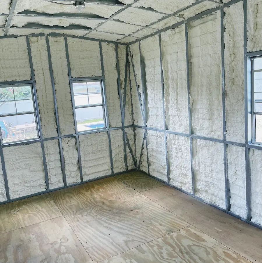 Closed-cell spray foam insulation applied to wall cavities in a residential project in Steubenville